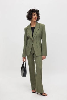 Flared Mid Waist Suit Pants Tailored Green Wide Leg Pants For Formal Occasions, Formal Green Wide Leg Pants For Fall, Green Wide Leg Pants For Formal Fall Occasions, Chic Olive Pants For Workwear, Chic Olive Pants For Work, Chic Tailored Green Wide Leg Pants, Elegant Olive Bottoms For Workwear, Green Tailored Wide Leg Pantsuit, Green Tailored Wide-leg Pantsuit