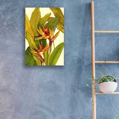 a bird of paradise painting hanging on a wall