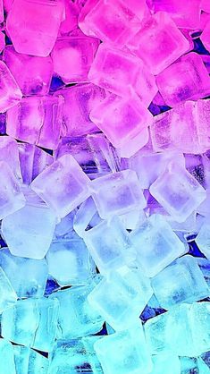 ice cubes with different colors and shapes on them are shown in close up view