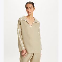 Designed to wear over a bathing suit or paired with pants for a relaxed look, our linen beach shirt is a vacation essential. Featuring an open collar and drop shoulder seams, contrast binding adds subtle detailing. Comfortable, versatile and timeless. Linen Beach Pants, Beach Pants, Beach Shirt, Cargo Pant, Beach Shirts, New Handbags, Linen Dress, Bathing Suit, Drop Shoulder