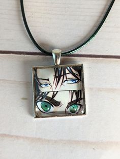 This is a handmade necklace, made with my artwork. Domed Glass top Handmade Artistic Necklace With Rectangular Shape, Anime Jewelry Necklaces, Baji Keisuke Necklace, Miku Necklace, Manga Jewelry, Elegant Blue Glass Necklaces, Inuyasha Necklace, Jewelry Anime, Anime Necklace