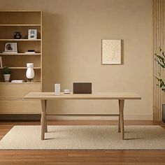 a living room with a table, bookshelf and vases on the floor