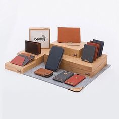 cách trưng bày theo từng brand Vendor Booth Display, Handmade Watch Strap, Brand Name Bags, Slim Leather Wallet, Handbag Stores, Leather Workshop