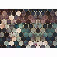 an abstract mosaic tile pattern with hexagonal tiles in shades of blue, pink and green