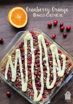 cranberry orange baked oatmeal in a glass dish with icing