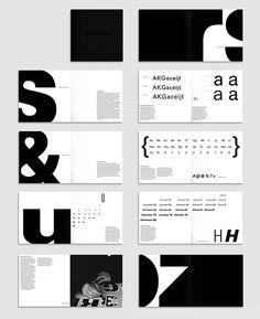 several black and white brochures are arranged in the shape of letters, numbers, and shapes