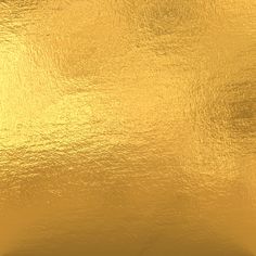 a close up view of a shiny gold surface