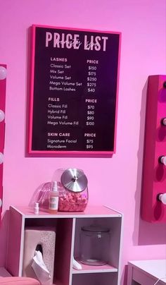 a pink room with lots of items on the shelves and a price list hanging above it