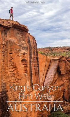 a man standing on top of a cliff with the words king's canyon rim walk australia