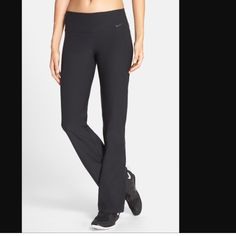 A Staple For Your Training Wardrobe, The Nike Power Pants Help You Move Through Your Workout Comfortably With High-Stretch Fabric That Helps Keep You Dry. The Mid-Rise Waistband Wraps Your Core For Supportive Coverage As You Move. They're Made With At Least 50% Recycled Polyester Fibers. Nike Stretch Athleisure Pants, Nike Fitted Black Yoga Pants, Nike Black Fitted Yoga Pants, Fitted Black Nike Yoga Pants, Nike Full Length Workout Pants, Nike Full Length Pants For Workout, Nike Stretch Workout Bottoms, Nike Stretch Bottoms For Workout, Nike Full-length Workout Bottoms