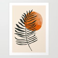 an orange and black palm leaf on a beige background with the sun in the background