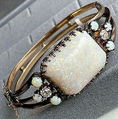 14K Rose Gold OEC Diamond HUGE Opal Cabochon Victorian Bangle Bracelet 6.75" | eBay Luxury White Opal Cabochon Ring, Luxury White Rectangular Jewelry, Elegant Multi-stone Opal Jewelry, Luxury Cabochon Bangle Jewelry, Luxury Opal Cabochon Jewelry, White Cabochon Jewelry For Formal Occasions, Formal Opal Jewelry With Gemstone Accents, Elegant Opal Jewelry With Gemstone Accents, Opal Jewelry With Gemstone Accents For Formal Occasions