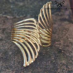 Hair Cuff Golden Wings for Locs, Sisterlocks, Dreadlocks and Braids – WhatNaturalsLove.com Thick Locs, Hair Cuff, Hair Thickness, Best Hair Care Products, Golden Wings, Hair Cuffs, Loc Jewelry, Afrikaanse Mode, Silver Wings