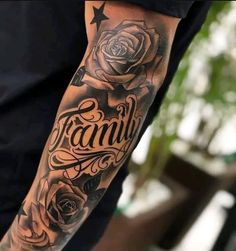 a man's arm with a rose and the word family written in cursive writing