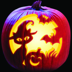 a carved pumpkin with cats and bats on it