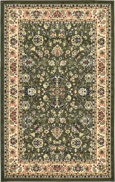 a green rug with floral designs on the bottom and beige trimmings around it