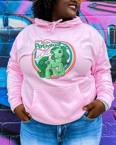 This baby pink hoodie is fit for any cute little pothead 💗🌈✨ Primary model is wearing size medium. This hoodie is unisex and printed direct-to-garment on 80/20 super soft cotton and polyester. Has a jersey lined hood and a front kangaroo pocket! To help preserve the vibrant colors, turn inside out before tossing in the dryer on low heat.