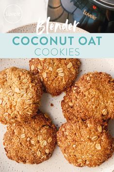 four oatmeal cookies sitting on top of a white plate