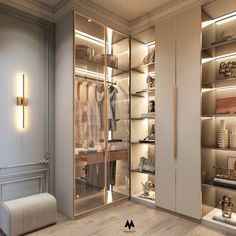 a walk in closet filled with lots of clothes and accessories on shelves next to a white bench