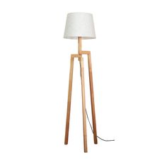 a wooden floor lamp with a white shade on it's base and a black cord plugged in