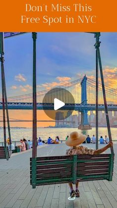 a person sitting on a swing in front of the bay bridge with text that reads, don't miss this free spot in nyc