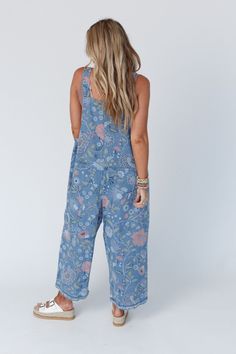 The newest addition to our High Hopes Overall Collection is the High Hopes Slouchy Denim Overalls in an eye-catching floral print! You're going to love these because they feature: Comfortable denim fabric with so cute floral print throughout Oversized, slouchy, loose overall silhouette for the ultimate comfort Wide pant legs at a cropped length Adjustable button straps (3 length options) for the perfect fit Patch pockets along the front bodice and along the backside Effortless boho outfit comfor Relaxed Fit Floral Print Cotton Jeans, Casual Indigo Jeans For Spring, Cotton Bottoms With Floral Print, Trendy Floral Print Cotton Jeans, Casual Denim Bottoms With Floral Print, Relaxed Fit Floral Print Jeans In Denim, Relaxed Fit Floral Print Denim Jeans, Casual Cotton Jeans With Floral Print, Relaxed Fit Floral Print Jeans