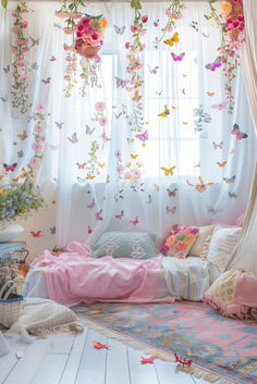 a room with flowers and butterflies hanging from the ceiling, curtains on the windowsill