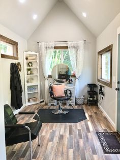 the room is clean and ready to be used as a hairdresser's office