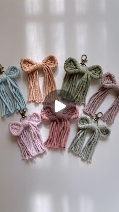 small knitted bow clips in pastel colors on a white surface with text overlay