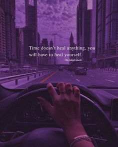 a person driving in a car with the words time doesn't heal anything, you will have to heal yourself