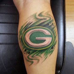 a green bay packers tattoo on the leg