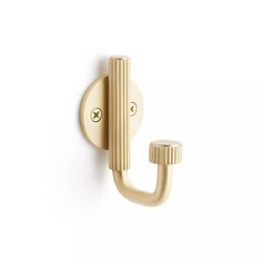 an image of a door handle on a white wall