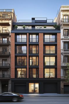 an apartment building with many balconies and windows