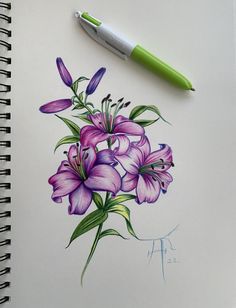 a drawing of purple flowers on a white paper next to a green ballpoint pen