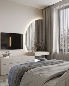 a bedroom with a large flat screen tv mounted to the side of it's wall