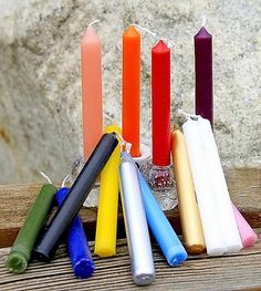 six candles are lined up in a row