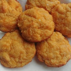 a pile of fried food sitting on top of a white paper