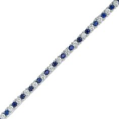 Dainty and dazzling, this tennis bracelet increases the sparkle factor of any attire. Crafted in sterling silver, this simply glistening style showcases alternating 2.0mm lab-created bright blue and shimmering white sapphires. Buffed to a brilliant luster, this 7.25-inch bracelet secures with a box clasp. Sapphire Tennis Bracelet With Round Diamonds, Blue Cubic Zirconia Tennis Bracelet Fine Jewelry, Sapphire Diamond Tennis Bracelet With Round Shape, Sapphire Diamond Tennis Bracelet With Round Cut, Classic Sapphire-colored Cubic Zirconia Bracelets, Blue Round Tennis Bracelet With Prong Setting, Blue Tennis Bracelet With Prong Setting, Classic Sapphire Tennis Bracelet With Prong Setting, Blue Tennis Bracelet With Prong Setting For Formal Occasions