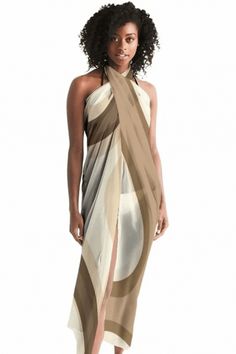 Our Sheer Sarong Swimsuit Cover Up Wrap / Lightweight Shoulder Drape Scarf, embodies versatility and style. This chic scarf accessory effortlessly transitions from a shoulder shawl to a beach cover-up, offering multiple styling options for any occasion. Crafted from sheer fabric, this lightweight scarf wrap adds an elegant touch to your beach ensemble, doubling as a fashion scarf for ladies seeking both functionality and flair. Whether lounging poolside or strolling along the shore, our oversized scarf serves as the perfect cover-up wrap for swimsuits, ensuring you stay cute and stylish under the sun. Accessorize with confidence and embrace the multiuse capabilities of this versatile sarong cover-up, a must-have addition to your beachwear collection. 100% Polyester material Lightweight, fl Summer Sarong For Beach Cover-up, Chic Tie-side Sarong For Beach Cover-up, Chic Tie-side Bottom Sarong For Beach Cover-up, Chic Beach Cover-up Sarong With Tie-side, Luxury Beach Cover-up Sarong, Sarong Swimsuit Cover, Shoulder Shawl, Chic Scarf, Beachwear Collection