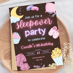 this is a sleepover party with popcorn and other items on the table, including a card