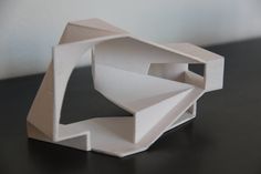 an origami sculpture sitting on top of a table