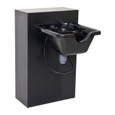 a black box with a water fountain in it