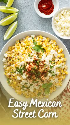 mexican street corn in a white bowl with cilantro on the side