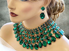 2. "Turn heads with our exquisite Drag Queen Bib Necklace and Earrings Set in emerald green! Elevate your look and exude elegance at your next event. 👑✨ #DragQueenJewelry #BibNecklace #ElegantStyle" Western Jewelry Necklace, Ballroom Jewelry, Ombre Necklace, Shoulder Jewelry, Queen Jewelry, Beautiful Costumes, Green Ombre, Perfect Palette, Necklace Statement