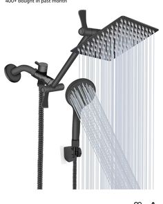 the shower head is connected to an overhead sprayer and has rain coming from it