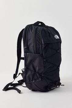 The North Face Borealis backpack is fitted with a FlexVent suspension system with a flexible yoke built from custom injection-molded shoulder straps, a padded mesh back panel and a breathable lumbar panel for an ultra-comfy feel at school, work or travel. Features The North Face Borealis backpack Lightweight backpack design Stand-up style 15" laptop sleeve Tons of flexible padding for comfort Padded mesh back panel Water bottle pocket Content + Care Recycled nylon ripstop with DWR finish Spot clean Imported Size 28L Dimensions: 13.25" l 9.75" w x 19.75" h | The North Face Borealis Backpack in Black, Women's at Urban Outfitters The North Face Black Backpack With Adjustable Strap, The North Face Black Hiking Backpack, The North Face Sports Backpack, Black The North Face Backpack For Hiking, Black The North Face Hiking Backpack, The North Face Sporty Standard Backpack, Sporty The North Face Standard Backpack, The North Face Nylon Backpack With Adjustable Strap, The North Face Backpack With Adjustable Strap In Nylon