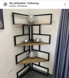 a corner shelf with some vases on it