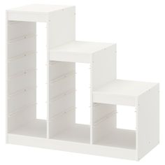 three white shelving units stacked on top of each other, with one shelf open