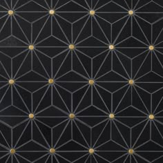 an abstract black and gold wallpaper with small circles in the center, on top of it