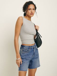 Fresh denim. Shop the Raye Mid Rise Relaxed Jean Shorts from Reformation, a mid rise, 5 pocket, rigid denim short with a zip fly closure. Mid Rise Jean Shorts, Time Clothes, Essential Dress, Swimming Outfit, Swimwear Dress, Relaxed Jeans, Jacket Long, Denim Short, Outerwear Sweater